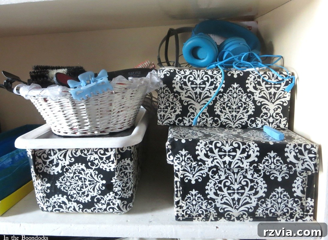 Repurposed Chic: A Teen Girl's Unique Bedroom Makeover 9 Matching boxes for earphone organization, a clever DIY solution for small electronics in a teen's room.