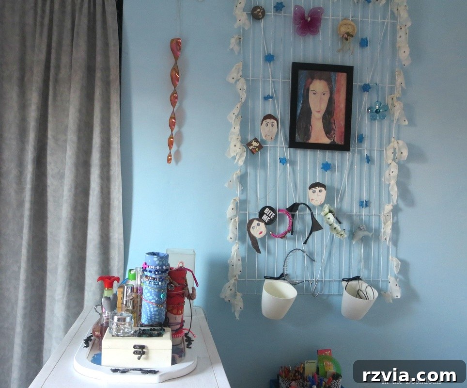 Repurposed Chic: A Teen Girl's Unique Bedroom Makeover 16 Bracelet holder on top of the dresser, an elegant solution for jewelry organization in a teen's bedroom.