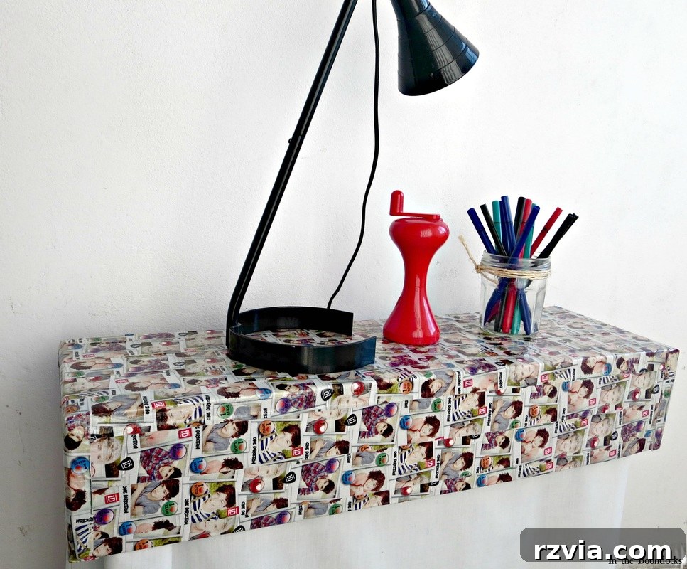 Close-up of the Washi tape decorated cardboard heater cover, showcasing the repurposed design. Hiding under the wrong direction www.theboondocksblog.com