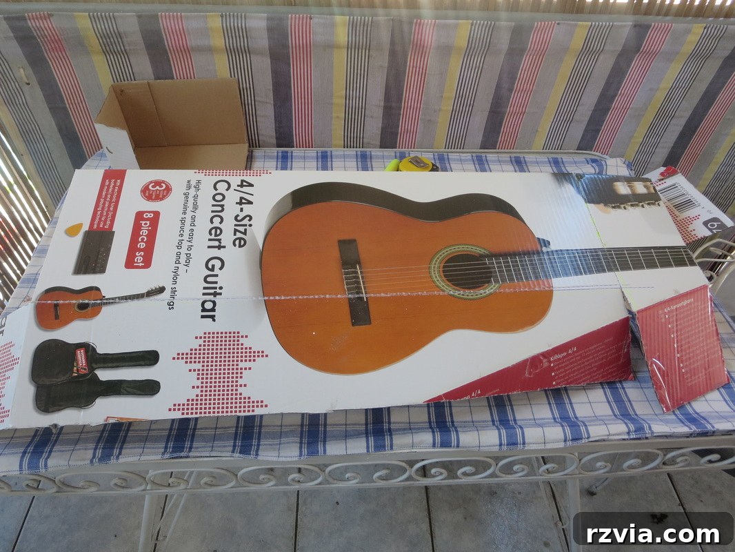 Measuring and cutting an old guitar cardboard box for a DIY heater cover. Hiding under the wrong direction www.theboondocksblog.com