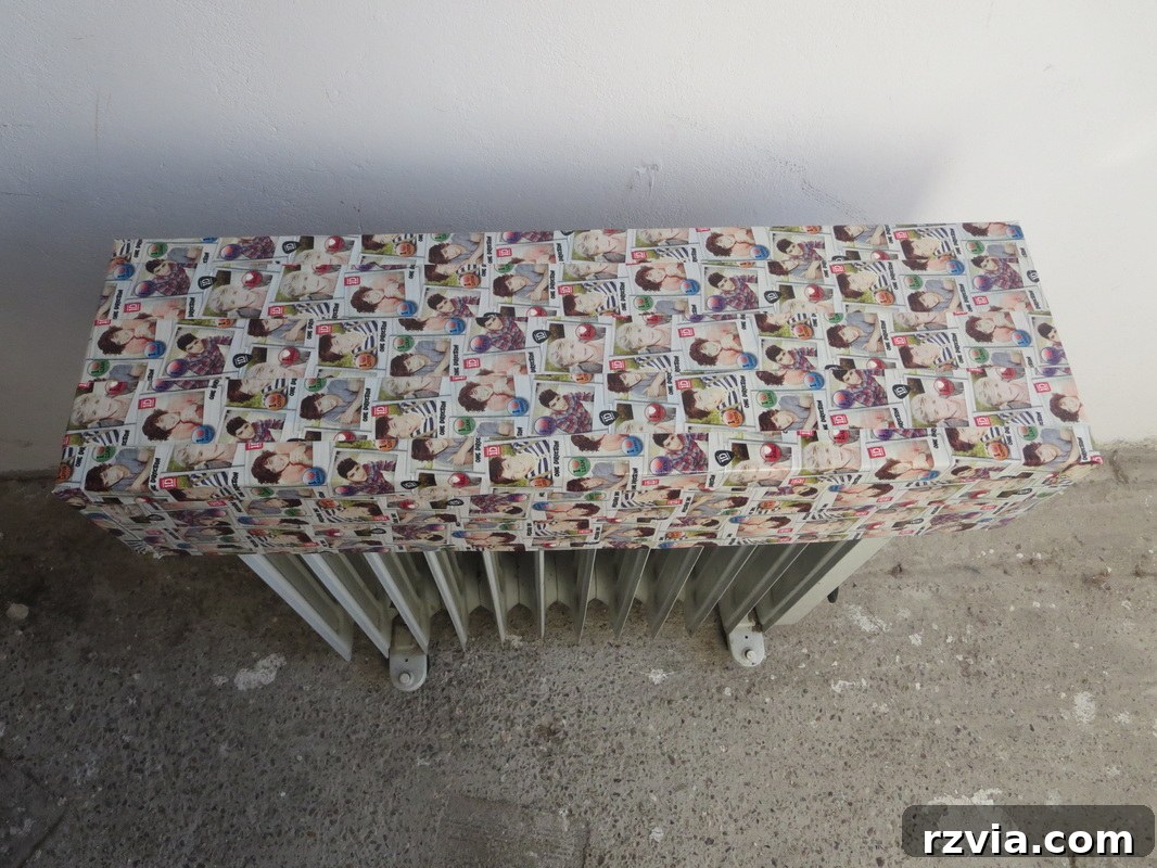 Decorating cardboard heater cover with One Direction Washi tape for a playful look. Hiding under the wrong direction www.theboondocksblog.com