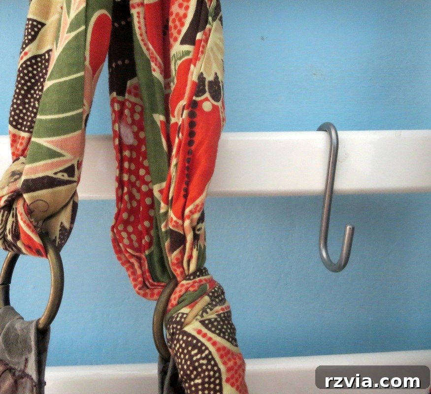 A collection of various hooks from Ikea used for the crib rail organizer, highlighting the flexibility in choosing different styles for different accessories. Practical IKEA storage solutions.