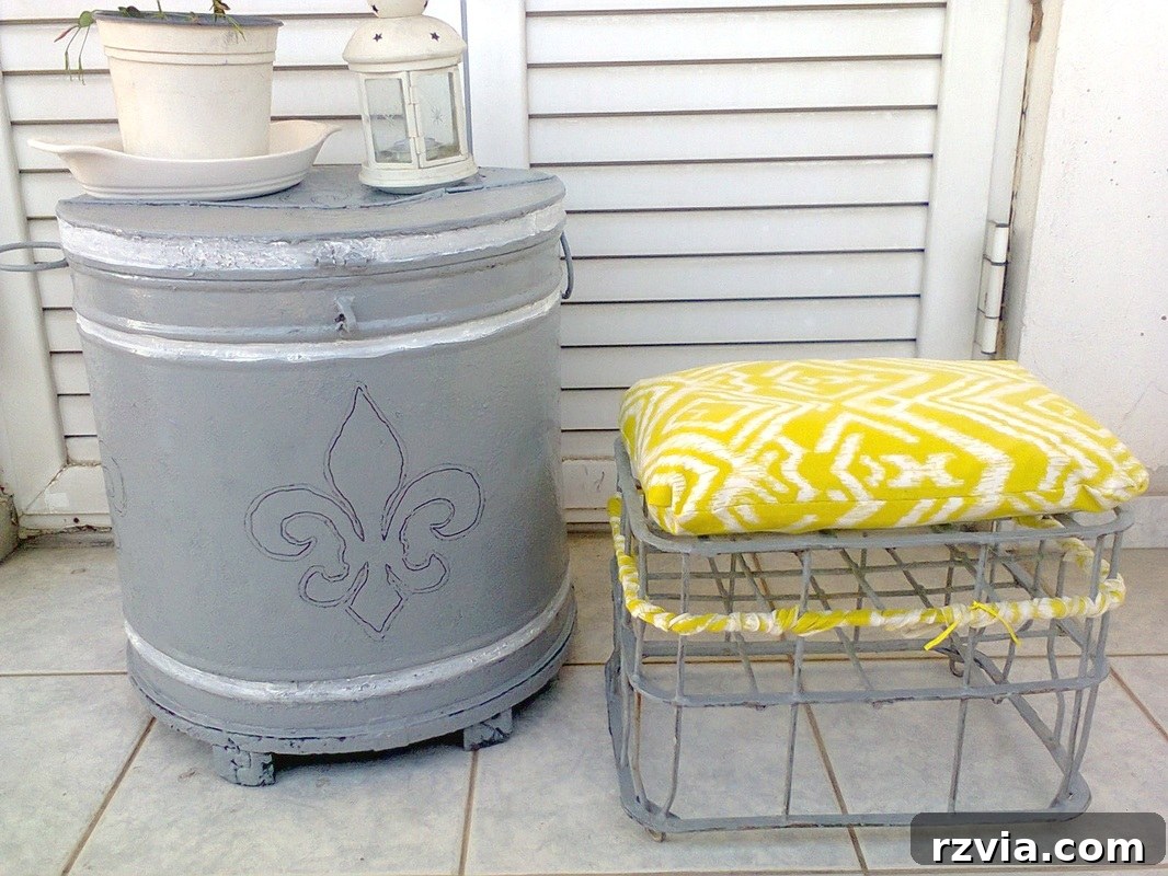 The finished milk crate stool complementing a beautifully restored barrel, demonstrating cohesive outdoor decor through upcycling. Repurposed furniture ideas.