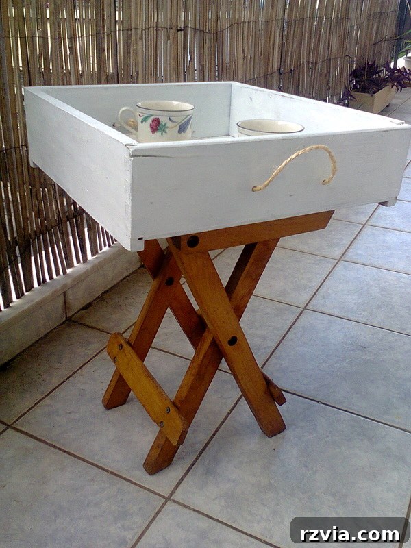 Drawer and stool repurposed into checkered table, #DIYfurniture #repurposeddrawer #repurposedstool #checkerdesigntable #easyfurniture Pieces of a table, www.theboondocksblog.com