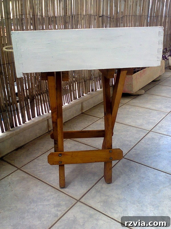 Drawer and stool repurposed into checkered table, #DIYfurniture #repurposeddrawer #repurposedstool #checkerdesigntable #easyfurniture Pieces of a table, www.theboondocksblog.com