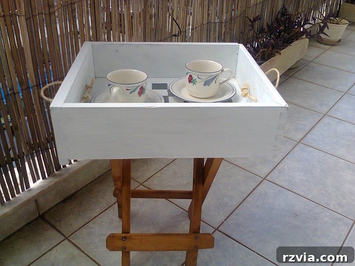 Drawer and stool repurposed into checkered table, #DIYfurniture #repurposeddrawer #repurposedstool #checkerdesigntable #easyfurniture Pieces of a table, www.theboondocksblog.com