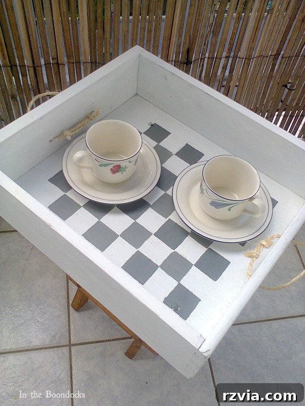 Drawer and stool repurposed into checkered table, #DIYfurniture #repurposeddrawer #repurposedstool #checkerdesigntable #easyfurniture Pieces of a table, www.theboondocksblog.com
