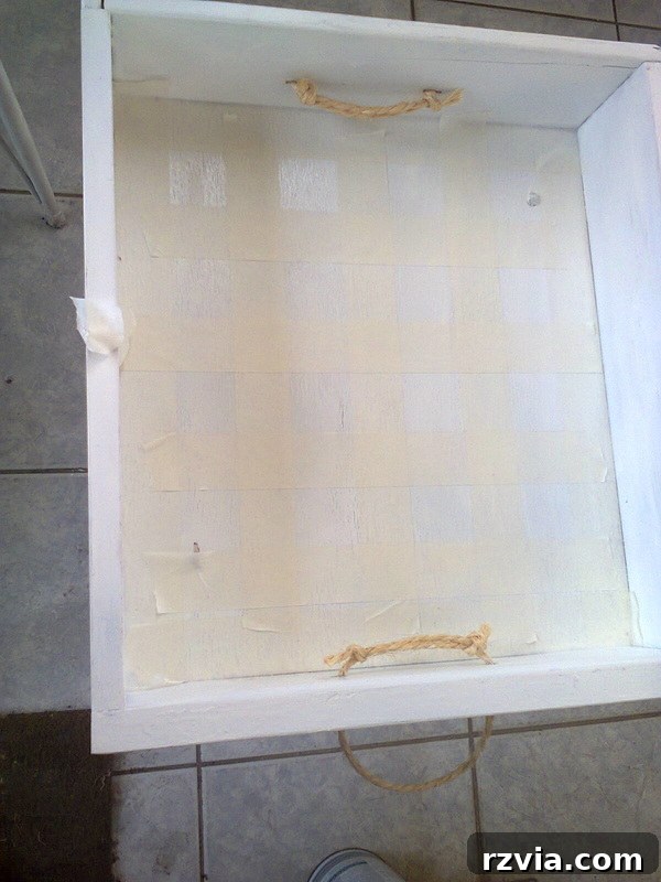adding masking tape to make checker design, Pieces of a table, www.theboondocksblog.com