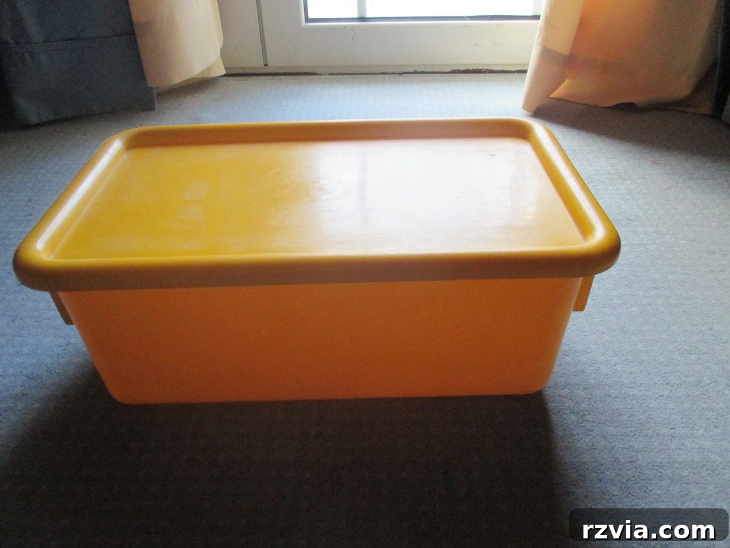 Yellow box before makeover, showing the transformation from color to black and white