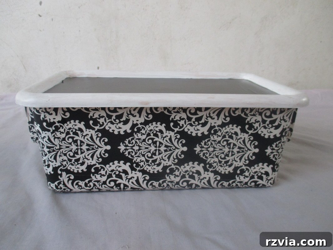 Finished decoupaged box, showcasing the new black and white aesthetic