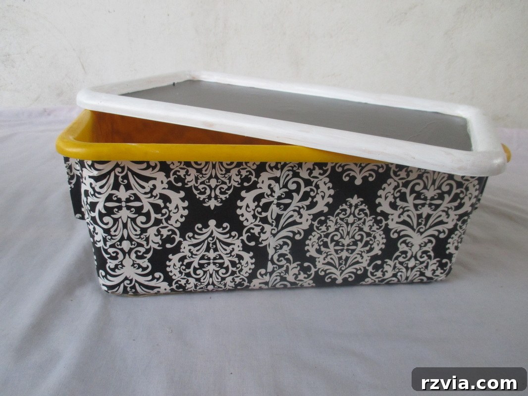 Yellow peeking out from inside the box, demonstrating the hidden color detail