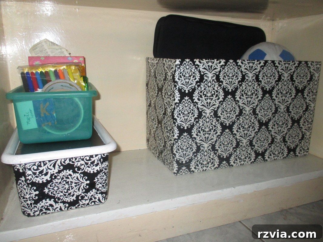 The transformed box on the bookcase, showing its integration into the newly organized space