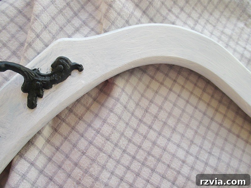 Reimagining a Vintage Serving Tray 6 Close up view of the vintage serving tray frame painted white.