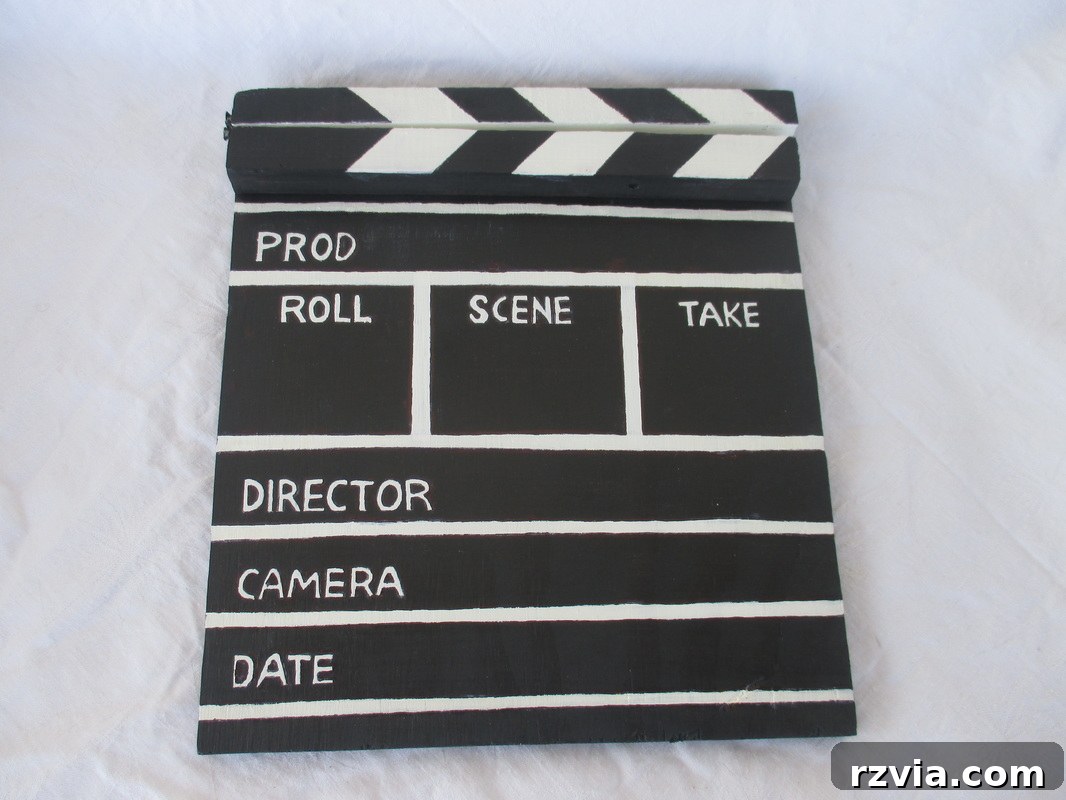 Applying finishing touches to the DIY clapperboard, A sound of inspiration www.theboondocksblog.com
