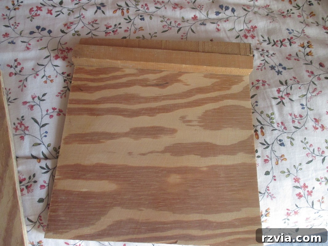 The top hinged pieces securely attached to the bottom plywood piece, A sound of inspiration www.theboondocksblog.com