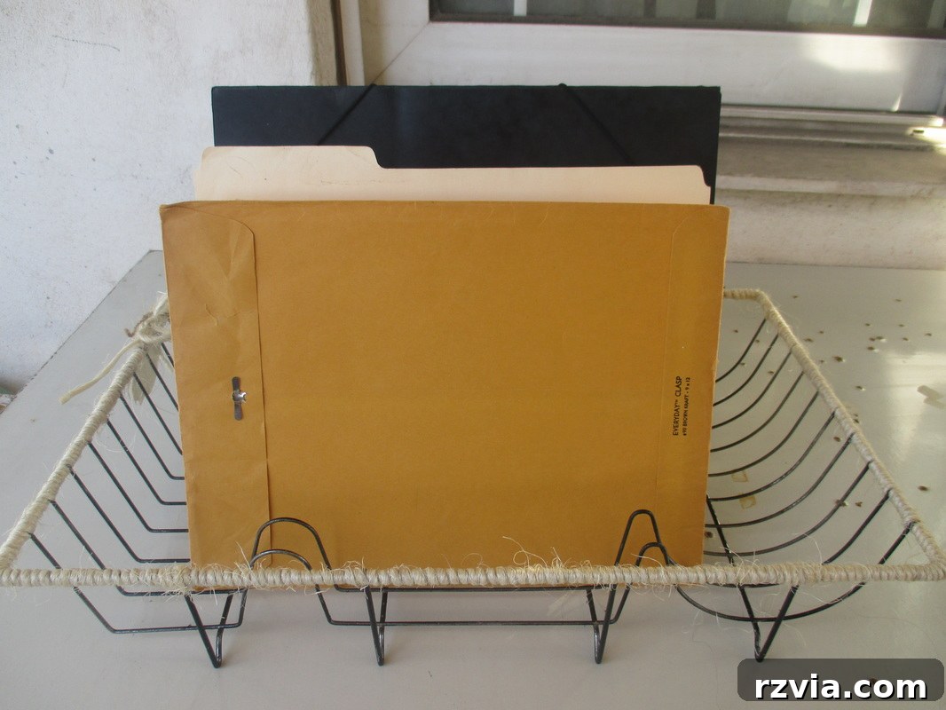 Another perspective of the repurposed dish rack as a file organizer