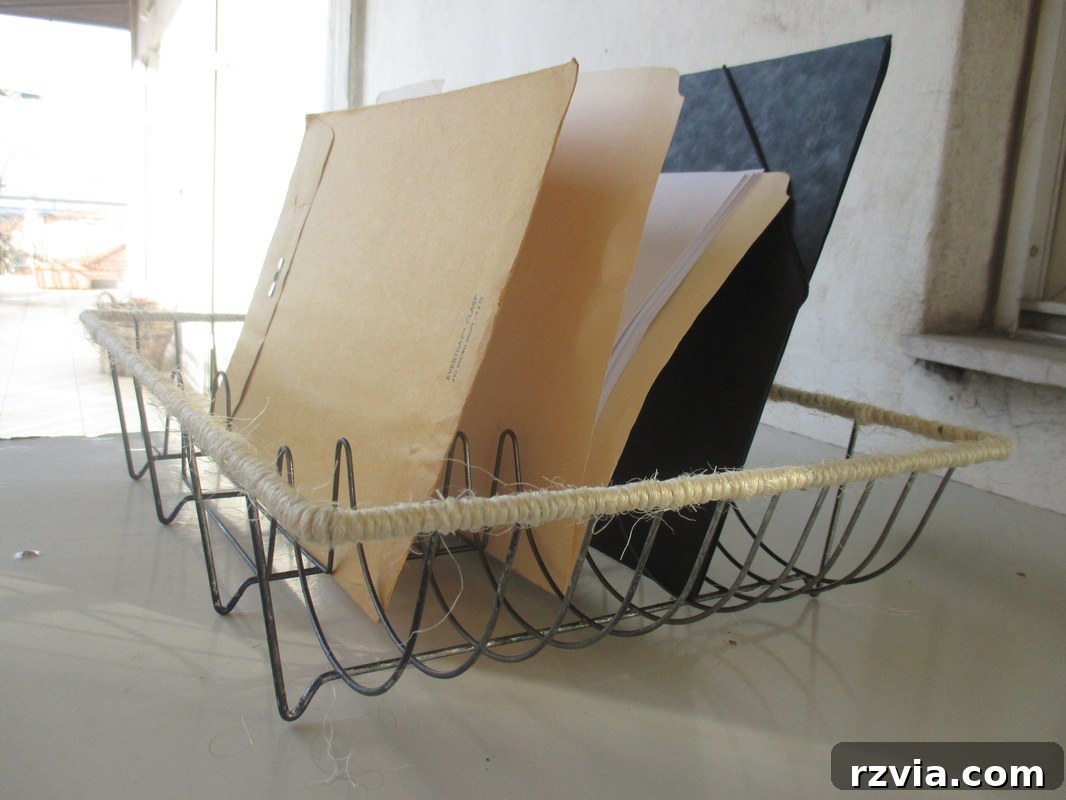 Repurposed dish rack used as a file holder