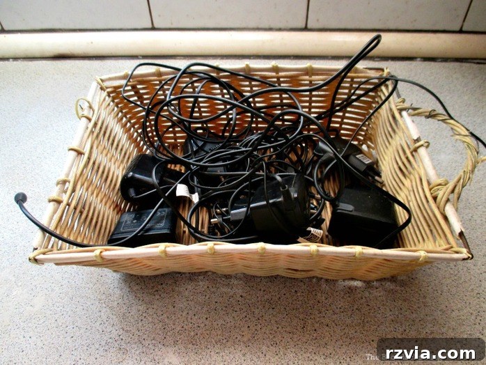 From Clutter to Clever Upcycled Cable Organizers 2 Organized cables and chargers in a DIY basket, untangling the wires project