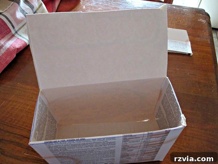 From Clutter to Clever Upcycled Cable Organizers 5 Fold tops inward on cut cereal boxes for wire organizer