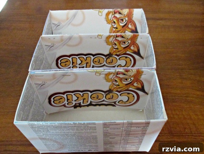 From Clutter to Clever Upcycled Cable Organizers 6 Staple 3 cereal boxes together to form base of wire organizer