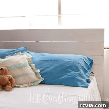 Rustic pallet wood headboard for a bedroom