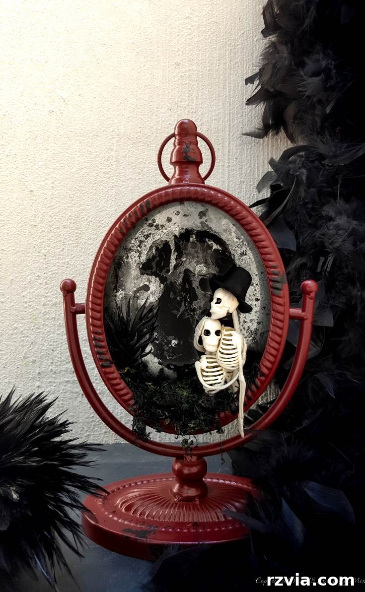 Repurposed clock transformed into a ghost mirror spooky Halloween decor by A Crafty Mix, featuring a skeleton couple.