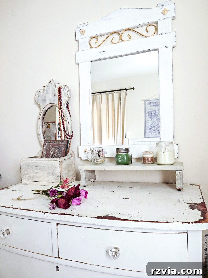 Effortless Side Mirror Refresh 2 Beautifully painted wood mirror featuring a chalky finish and elegant gold metallic accents, distressed and waxed to achieve a perfect vintage farmhouse look. An inspiring DIY upcycling project from a curbside find.