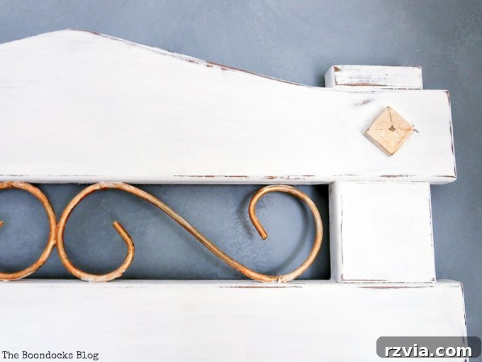 Effortless Side Mirror Refresh 10 Adding delicate gold accents to the distressed embellishments of the vintage mirror, elevating its charm and completing the farmhouse style makeover.