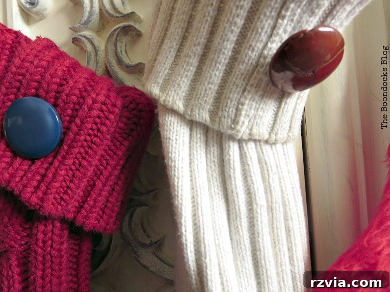 Repurpose Old Sweaters into Christmas Stockings 11 A collection of colorful buttons and ribbons adorning the top of various sweater stockings.