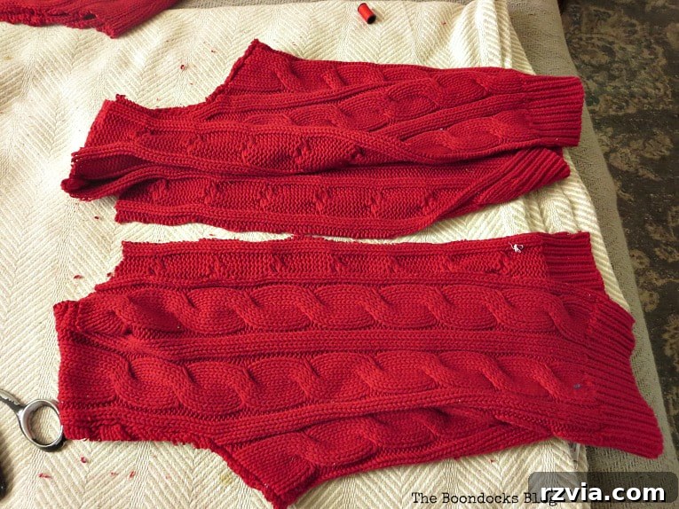 Repurpose Old Sweaters into Christmas Stockings 5 The sweater body after the turtleneck has been cleanly cut off, leaving a straight top edge.