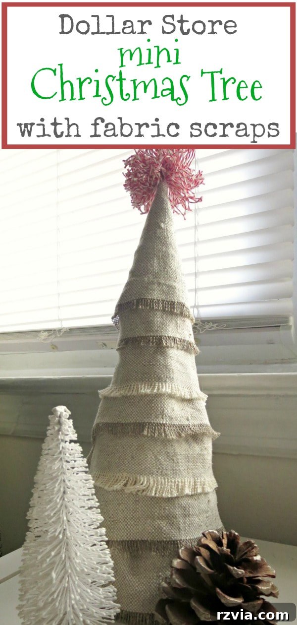 Craft a Charming Fabric Mini Tree from Dollar Store Finds 16 A captivating image showcasing a dollar store tinsel tree brilliantly transformed into a boho fabric scrap mini Christmas tree, adorned with a delicate twine pompom topper. The photo is styled with natural elements like pine cones and an evergreen branch, emphasizing its rustic charm.