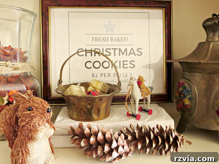 Repurpose Old Decor for Stunning Christmas Vignettes 16 A harmonious display featuring a brown picture frame and a brass basket, creating a warm and earthy Christmas vignette.