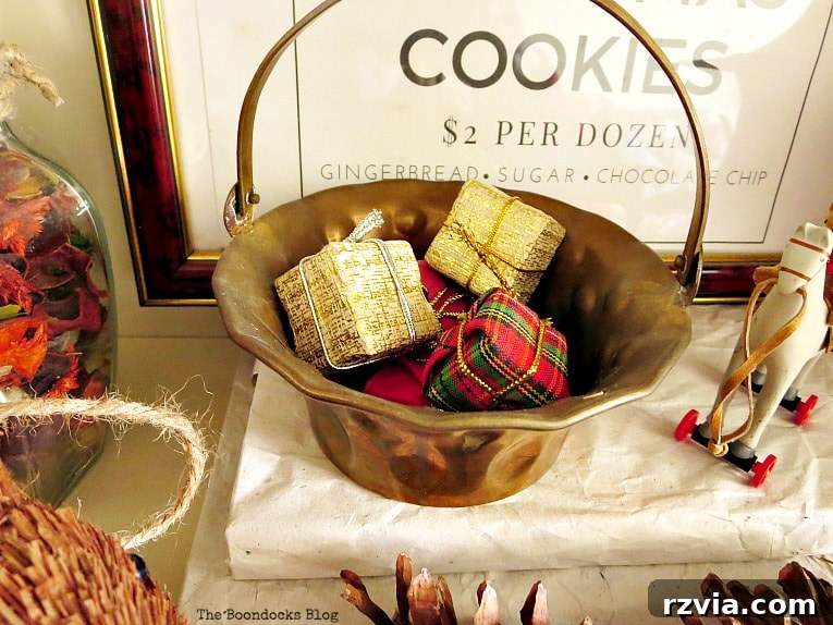 Repurpose Old Decor for Stunning Christmas Vignettes 17 Tiny presents nestled within a brass basket, demonstrating how small details and repurposed items can enrich a Christmas vignette.