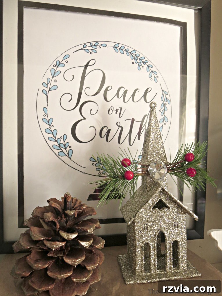 Repurpose Old Decor for Stunning Christmas Vignettes 6 A decorative picture frame with a festive printable, contributing to a cohesive blue and white Christmas vignette, showcasing easy and customizable holiday decor.