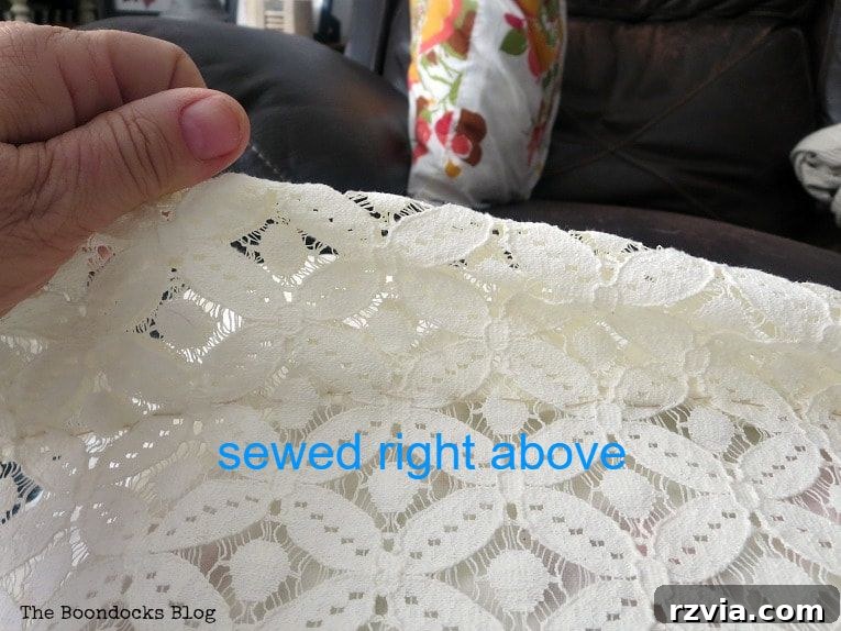 Upcycle Your Fabric Scraps: 5 Easy Pillow Projects 6 Demonstration of holding up excess lace on a pillow cover to create a decorative pleat.
