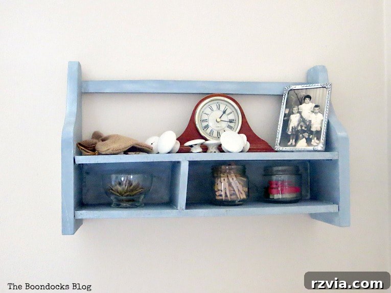 Before & After: Wall-mounted shelf awaiting its shimmering makeover, showcasing its potential for bedroom decor.