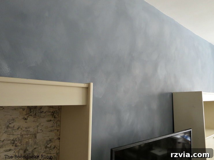 Create Your Own Dreamy Cloud Accent Wall 16 A side angle view of the accent wall, providing a different perspective of the successful cloudy effect.