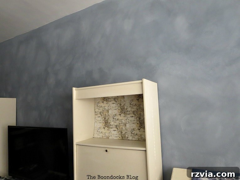 Create Your Own Dreamy Cloud Accent Wall 17 A close-up view of the accent wall, showcasing the intricate details and seamless blending of the cloudy effect.