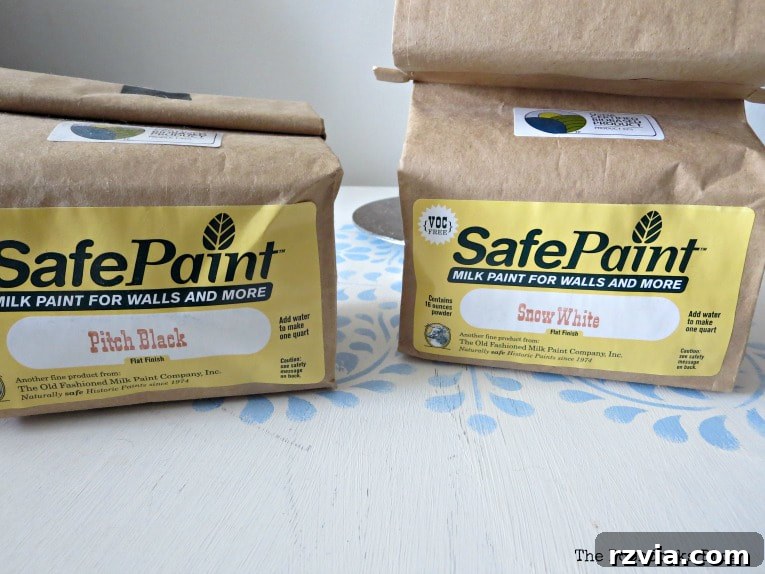 Create Your Own Dreamy Cloud Accent Wall 5 Bags of Old Fashioned Milk Paint Safepaint in Pitch Black and Snow White colors, ready for mixing.