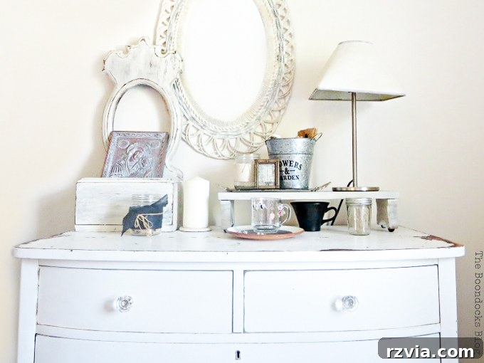 Jewel Your Furniture: Crystal Knobs for an Instant Upgrade 13 Close-up of the distressed white vintage dresser with crystal glass knobs, highlighting texture and sparkle.