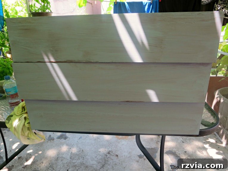 Dresser drawer fronts painted entirely in Snow White milk paint, showing a bright and consistent finish.