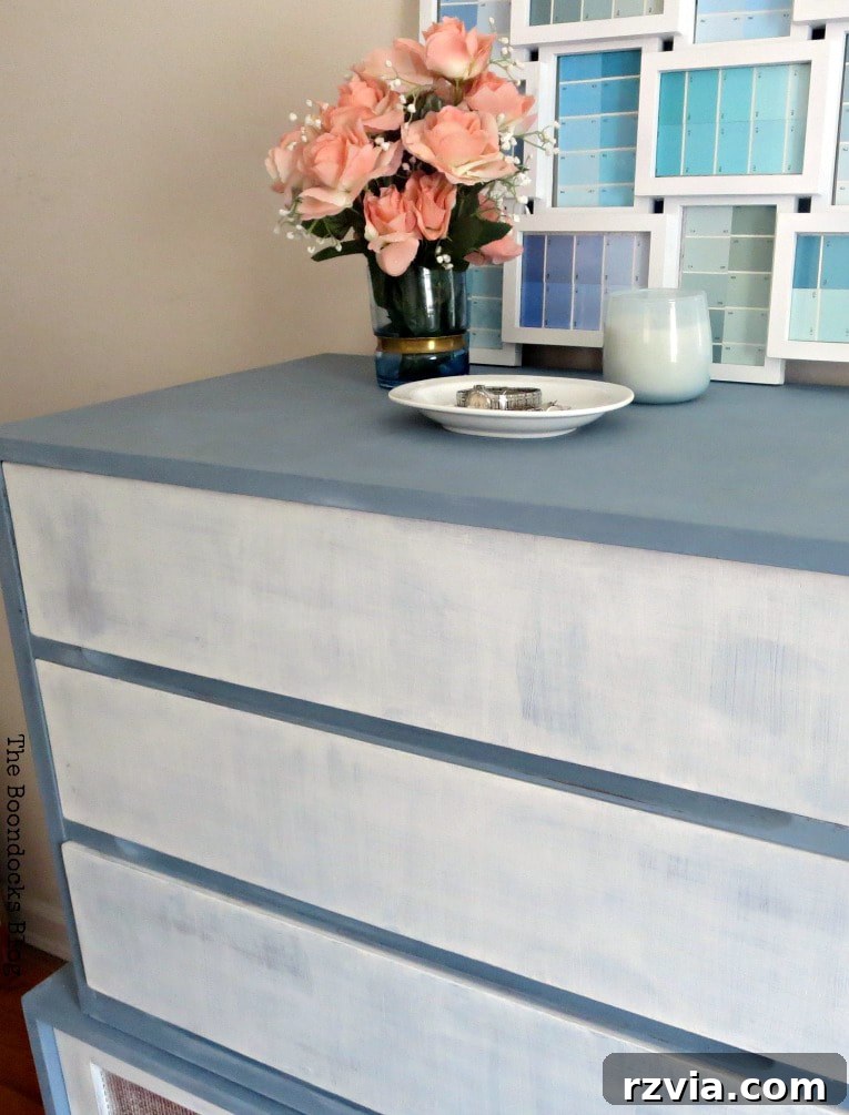 Combined MCM dresser and sideboard in their new white and slate finish, showcasing the harmonious and unified look. Keywords: #DIYproject #Midcenturymodernfurniture #MCMfurniture #paintedfurniture #oldfashionedmilkpaint #milkpaint