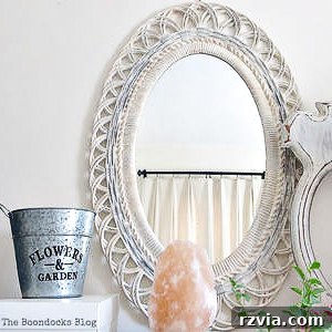 Upcycled plastic mirror with a new finish.