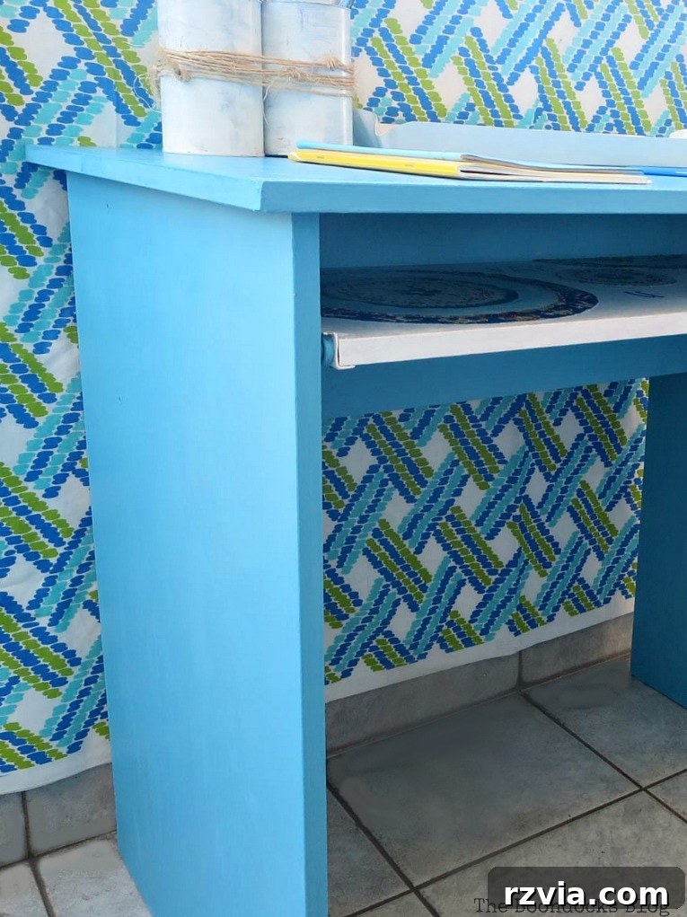 Revamp Your Wooden Chairs: Painting Made Easy 19 A vibrant blue IKEA desk makeover, transformed with chalky finish paint, offering a stylish and functional workspace with a personalized touch.