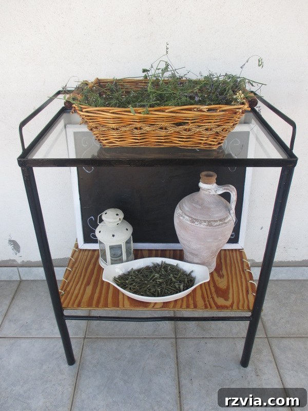 The finished table makeover, showcasing its new life as a decorative and functional piece.