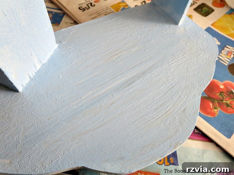 Painting the vintage book shelf with chalky finish paint