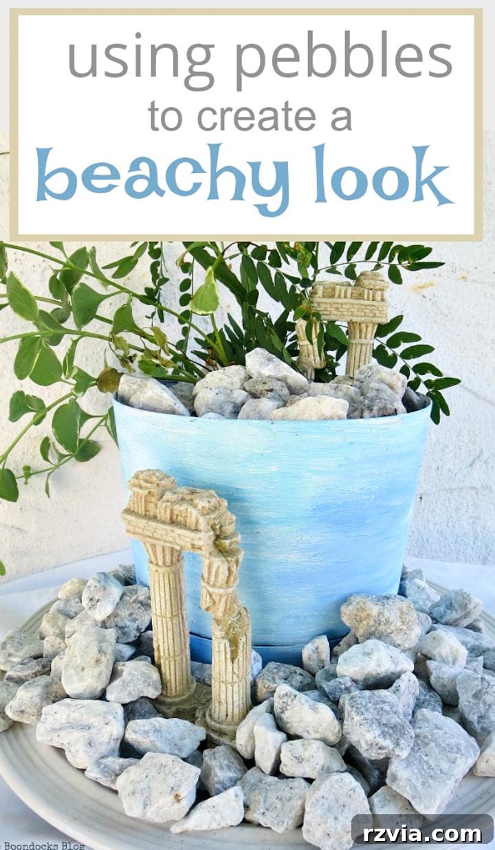 Seaside Style from Salvaged Treasures 20 The final DIY beachy planter vignette, an upcycled creation blending coastal charm, ancient elements, and a vibrant vinca vine for Mediterranean home decor.