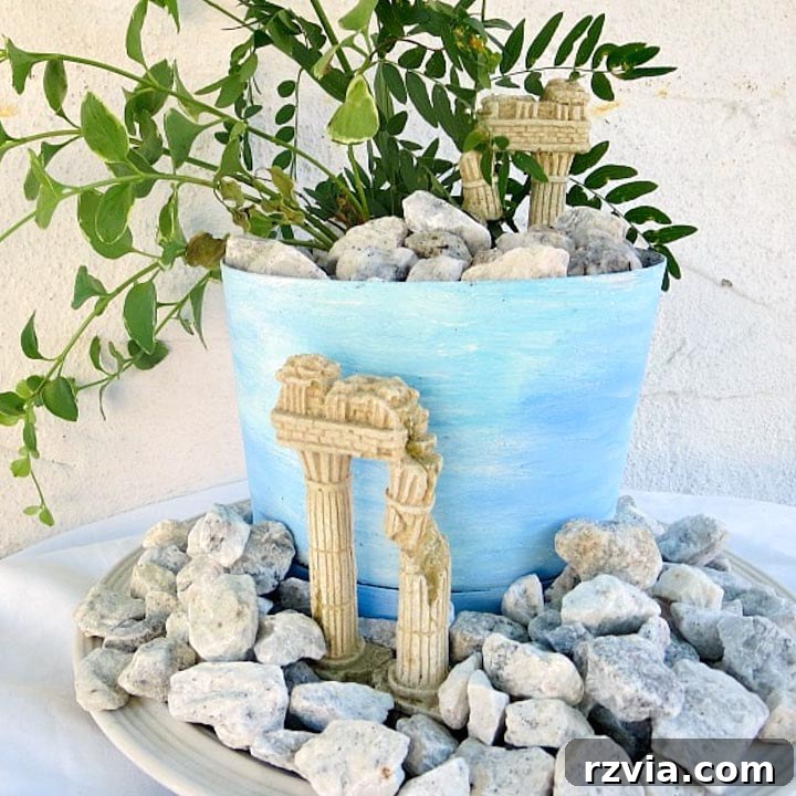 Coastal Creations from Repurposed Finds 20 Handmade beach art featuring natural pebbles arranged in a coastal vignette