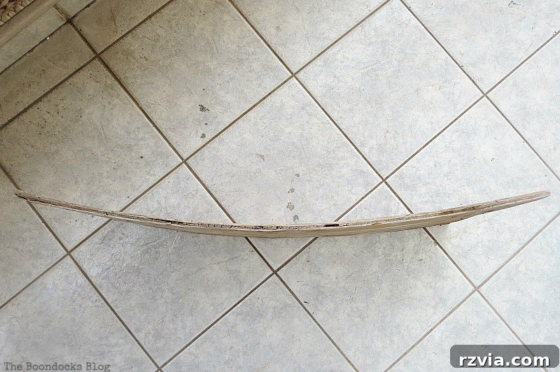 Coastal Creations from Repurposed Finds 4 Overhead view of a rough, untreated piece of plywood, prior to whitewashing for beach decor