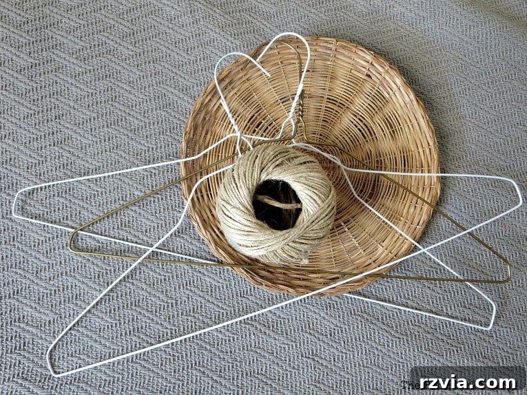 Beyond the Closet: Crafting Unique Mobiles from Wire Hangers 5 3 hangers, twine and a wicker plate charger.